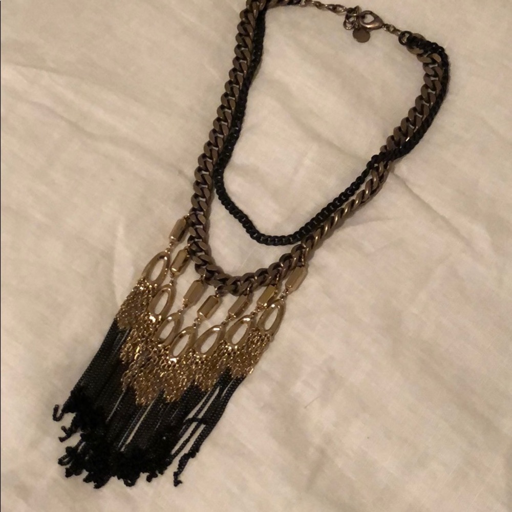 Mixes metal statement necklace